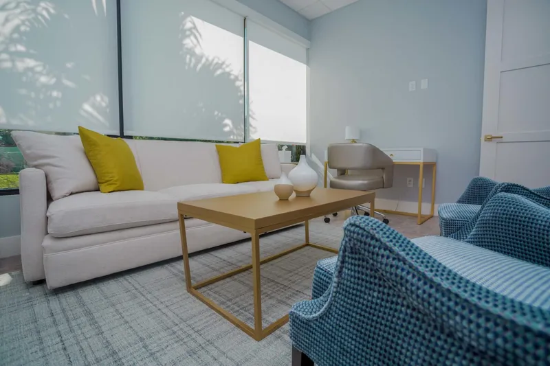 Khospace therapy room with blue sofa